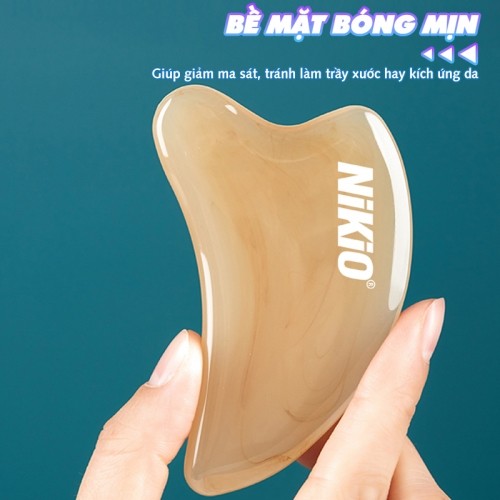 Dụng cụ massage nâng cơ mặt bề mặt bóng mịn Nikio NK-03C1