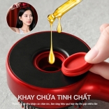 Lược massage đầu Nikio NK-112 khay chứa tinh chất